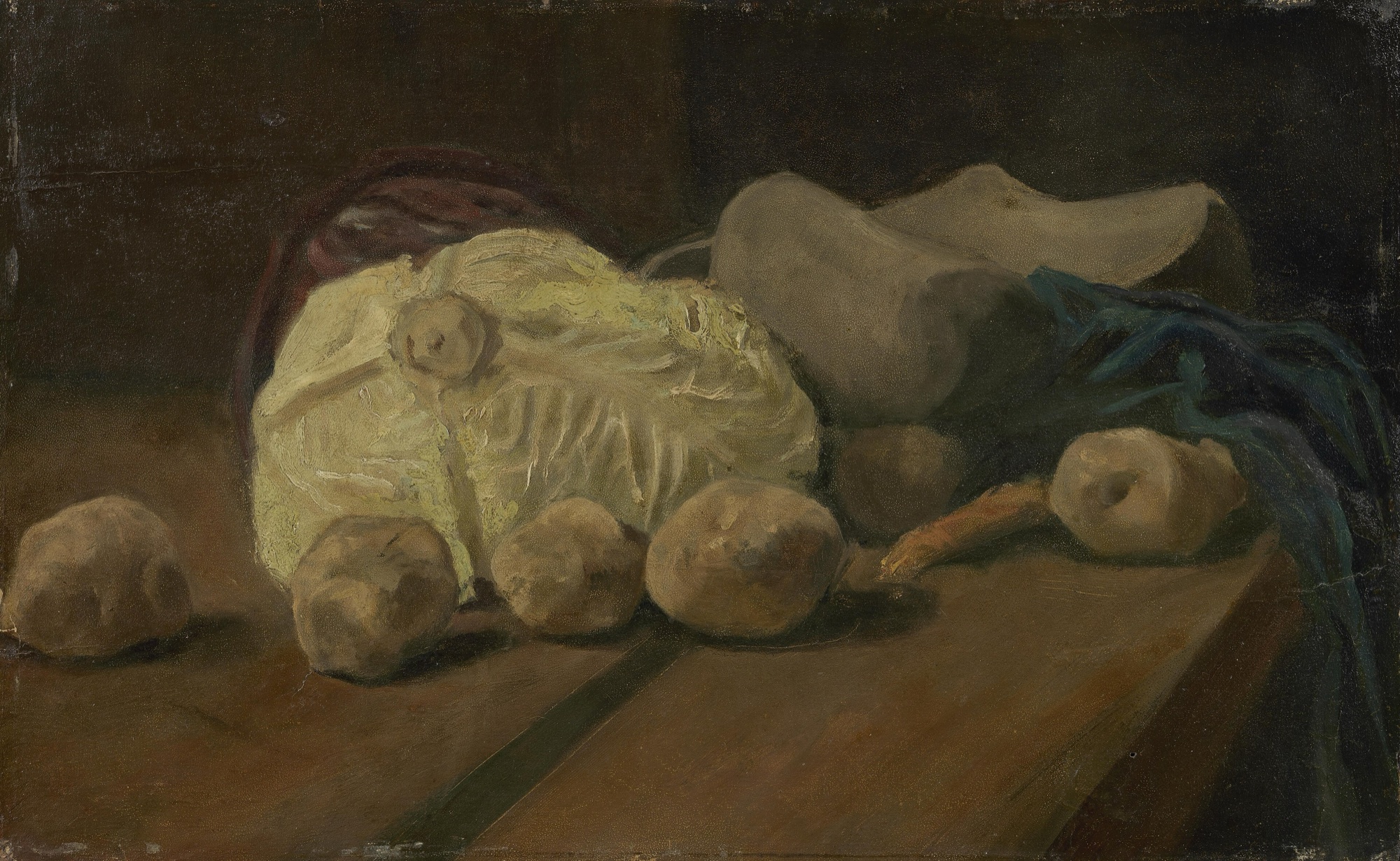 Натюрморт із капустою, картоплею та деревʼяними черевиками, Гаага, 1881. Приблизно через півтора року після рішення стати художником: землисті тони, обережний мазок, нічого схожого на «Соняшники» ще немає. Фото: Van Gogh Museum, Wikimedia Commons